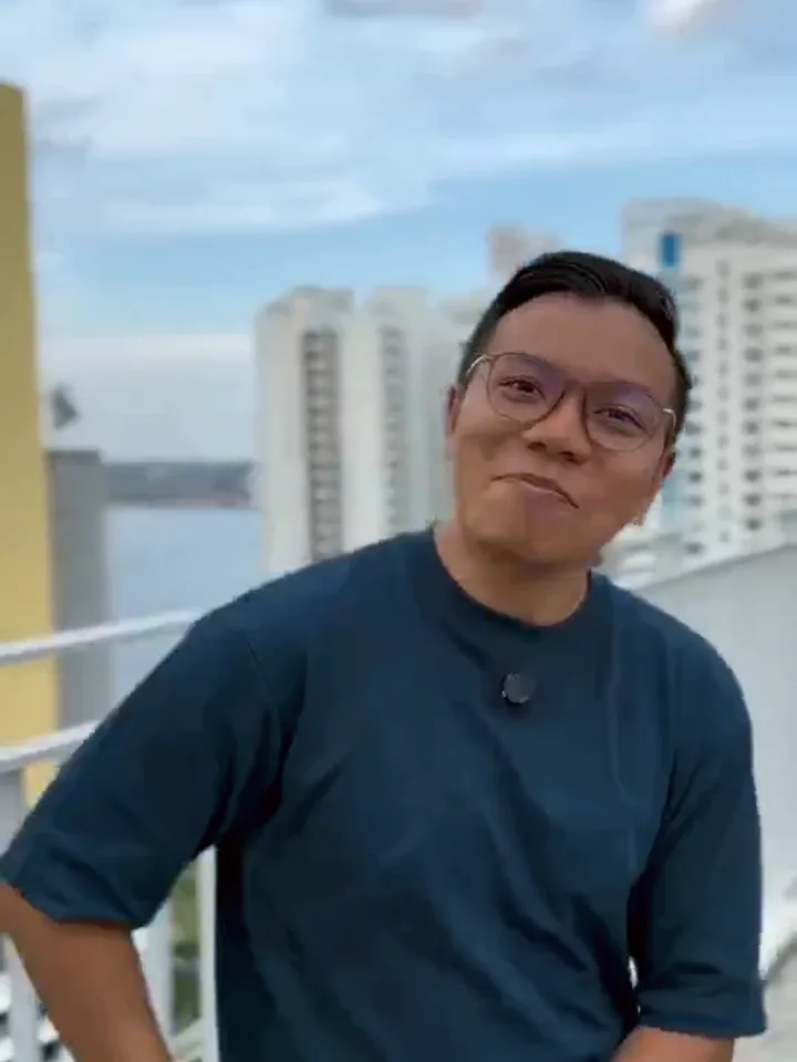 Fairoz on camera, on an HDB rooftop