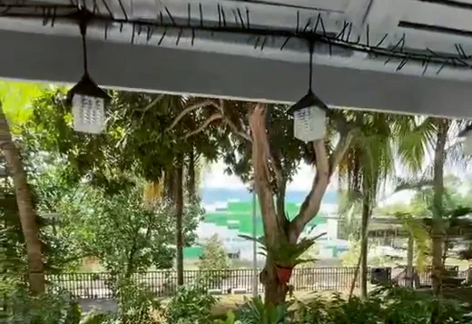 Covered walkway over a communal garden
